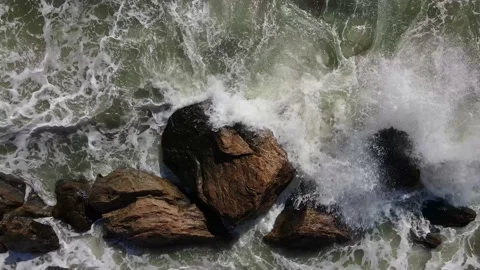 Aerial drone view of tidal waves coming from the sea Stock Footage 154034339