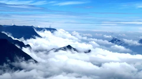 Aerial drone view time lapses A lot of clouds are going into the drone camera Stock Footage 264085682
