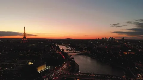 Aerial drone view of Tour Eiffel Tower and Seine River at sunset in France Stock Footage 131223425