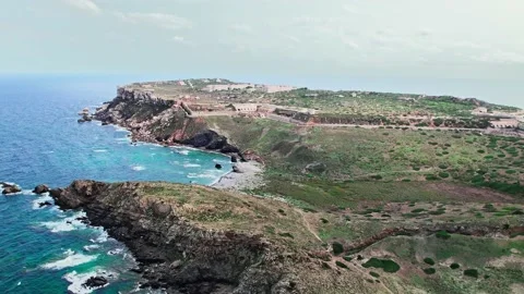 Aerial drone view of a touristic old Spanish Fortress by the end of the coast. Stock Footage 219571114