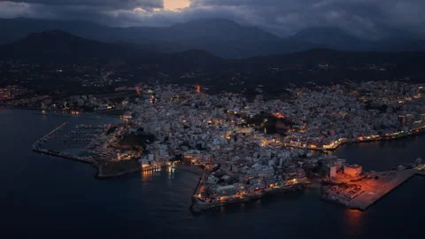 Aerial drone view of the town on its rocky peninsula with the marina, Agios 库存影片 339290570
