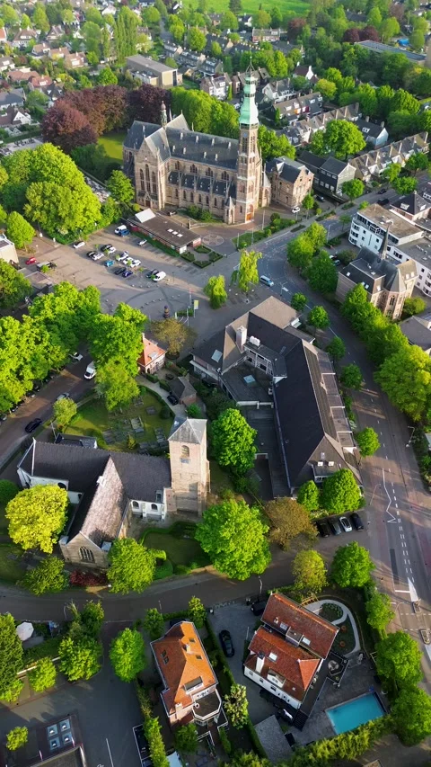 Aerial drone view of a town square with a parking lot Stock Footage 324516918