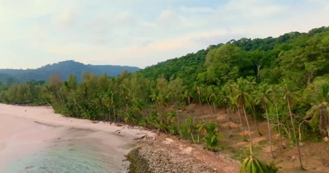 Aerial drone view of the tropical beach with clear turquoise sea, white sand Stock Footage 240524088