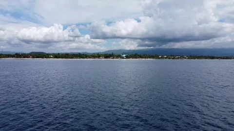 Aerial drone view of tropical White Beach in Moalboal Philippines with ocean 스톡 동영상 335394817