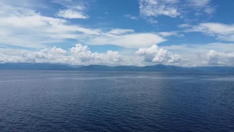 Aerial drone view of tropical White Beach in Moalboal Philippines with ocean Stock Footage 335395092