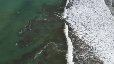 Aerial Drone View of Turquoise Waves Mixing with Sand in Uvita Costa Rica Stock Footage 337414245