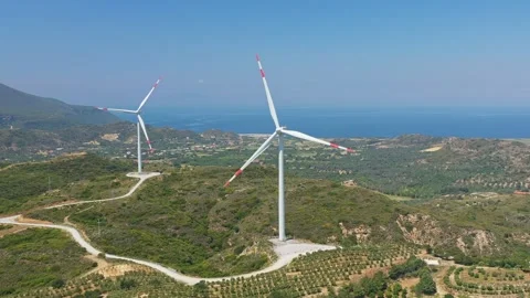 Aerial drone view of two windmills on a hill in Datcha region 스톡 동영상 249505776