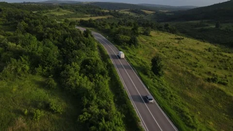 Aerial Drone View Van Driving on Curvy Mountain asphalt Road in summer 스톡 동영상 244544009