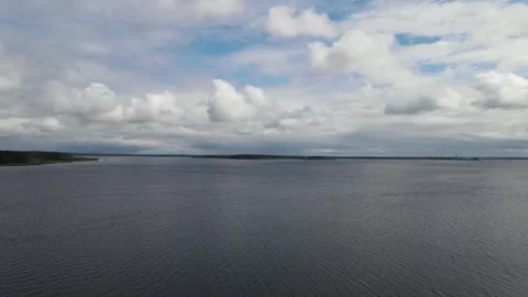 Aerial drone view of vast Lake Seliger under cloudy sky Stock Footage 338095321