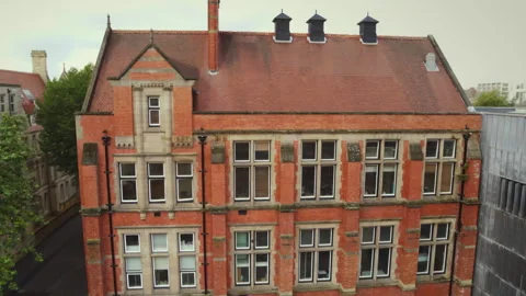 Aerial drone view of victorian red brick building in the UK Stock-Footage 336801060