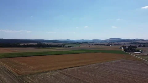 Aerial drone view video of a rolling hills landscape in Germany Stock Footage 236014702