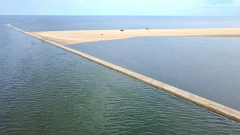 Aerial drone view of the Vistula River mouth flowing into the Baltic Sea, Poland Vidéo 343124357