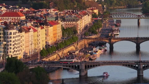 Aerial drone view of the Vltava riverfront with multiple bridges, the Dancing Stock Footage 336597395