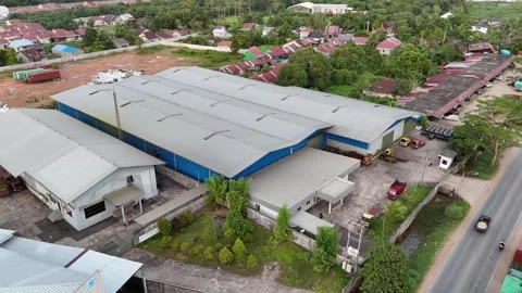 Aerial Drone View of Warehouse Complex with Blue Roofs Video stock 346897004