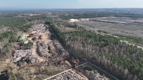 Aerial drone view of a waste dump on the edge of the forest, environmental .. Stock Footage 309957040