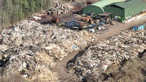 Aerial drone view of a waste dump on the edge of the forest, environmental .. Stock Footage 309957086