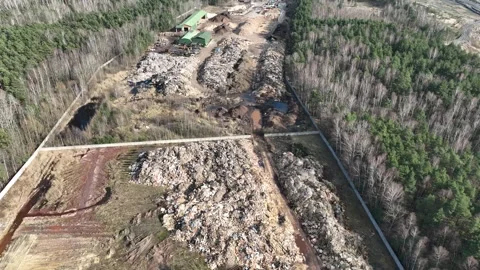 Aerial drone view of a waste dump on the edge of the forest, environmental .. Stock Footage 309957120