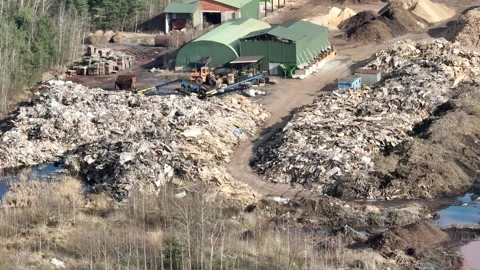 Aerial drone view of a waste dump on the edge of the forest, environmental .. Stock Footage 309957144
