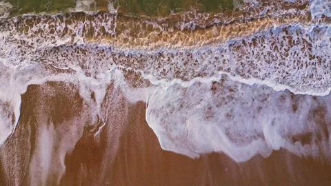 Aerial drone view of waves breaking on shore Stock Footage 238365884