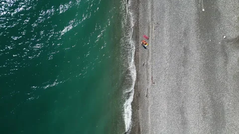 Aerial drone view of waves breaking on the beach sea coastline. Tropical beach Stock Footage 252817213