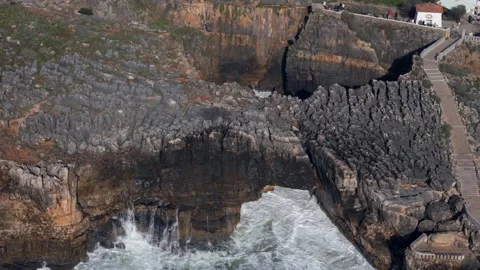 Aerial drone view of waves crashing at Boca do inferno, Cascais, Portugal Stock Footage 300489366