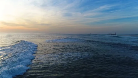Aerial Drone view of waves surfer paddling out Democrat Point Long Island NY Stock Footage 102518768