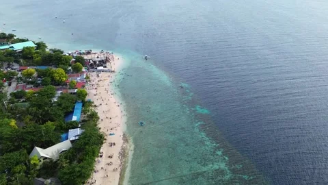 Aerial drone view of White Beach Moalboal Philippines with turquoise water 1 Stock-Footage 334634660