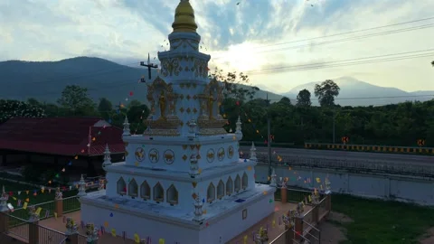 Aerial drone view of white Buddhist pagoda in  temple complex Stock Footage 336297557