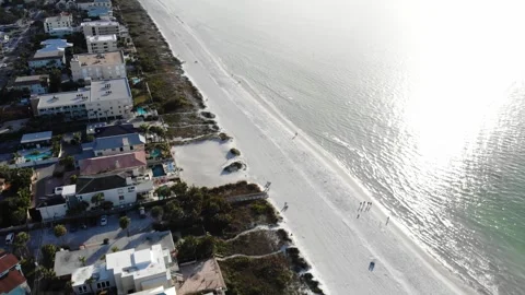 Aerial drone view of white sand beach and coastal hotels, St. Pete Beach Florida 스톡 동영상 330950622
