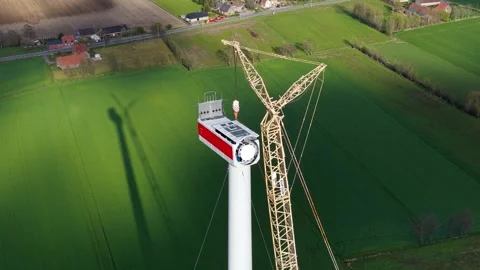 Aerial drone view of a wind farm during industrial construction Stock Footage 332078480