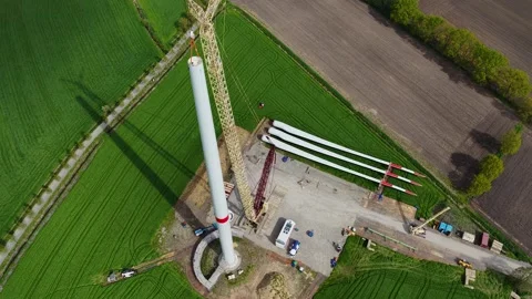 Aerial drone view of a wind farm during industrial construction Stock Footage 332974228