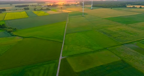 Aerial drone view of wind power turbines, part of a wind farm. Wind turbines  Video stock 197578599