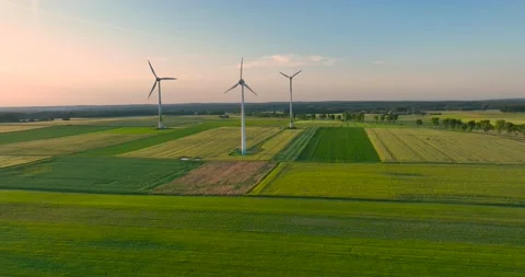 Aerial drone view of wind power turbines, part of a wind farm. Wind turbines  Stock Footage 197578783