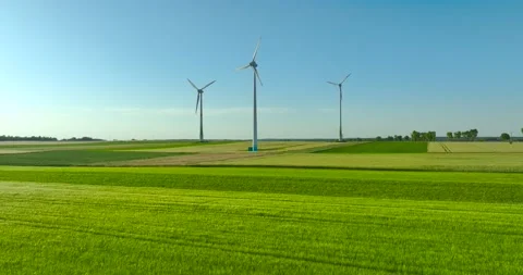 Aerial drone view of wind power turbines, part of a wind farm. Wind turbines  Stock Footage 197578850