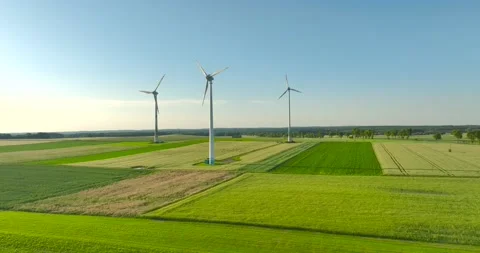 Aerial drone view of wind power turbines, part of a wind farm. Wind turbines  Stock Footage 198025677