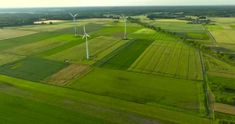 Aerial drone view of wind power turbines, part of a wind farm. Wind turbines  Stock Footage 198026959