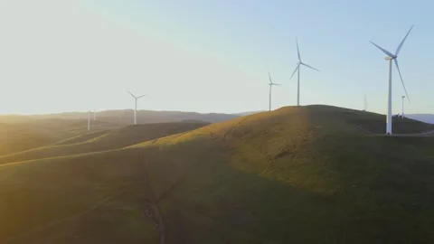 Aerial drone view of wind power plant on green hills near Livermore, Califo.. Stock Footage 232337161