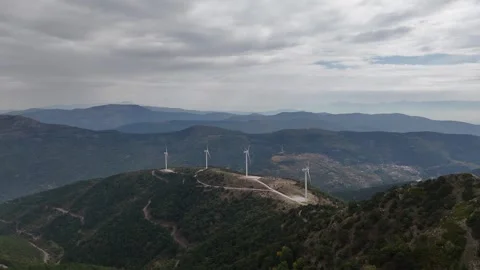 Aerial Drone View of Wind Turbines on a Mountain Summit Stock Footage 340108951