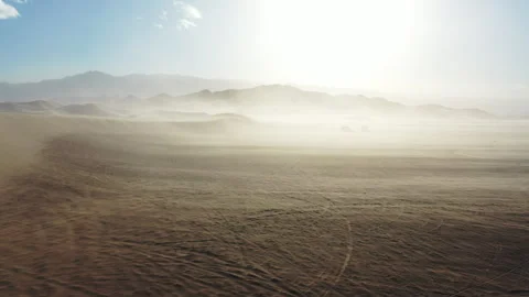 Aerial Drone View of the Wind Whipping through the Sand Dunes Stockbeeldmateriaal 326719735