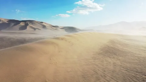 Aerial Drone View of the Wind Whipping through the Sand Dunes Stock Footage 326719752