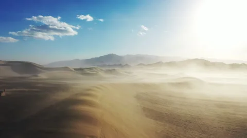 Aerial Drone View of the Wind Whipping through the Sand Dunes Video stock 326720250