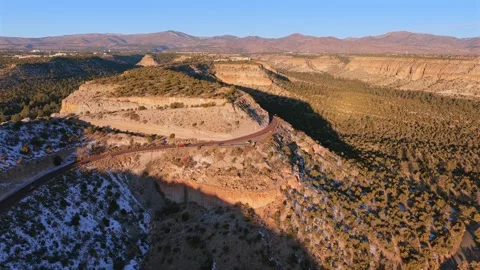 Aerial Drone View of Winding Mountain Highway on Los Alamos Mesas in New Mexico Stock Footage 328715038