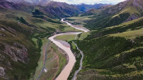 Aerial Drone View of Winding River Through Mountain Valley in Western Sichuan Stock Footage 333667672