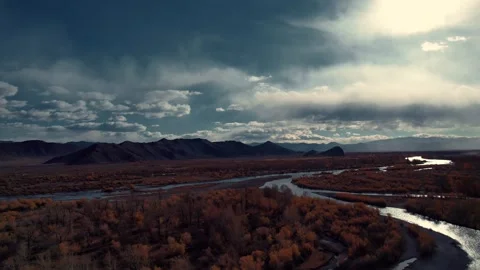 Aerial Drone View of Winding River Through Altai Mountains in Mongolia Stockbeeldmateriaal 335134150