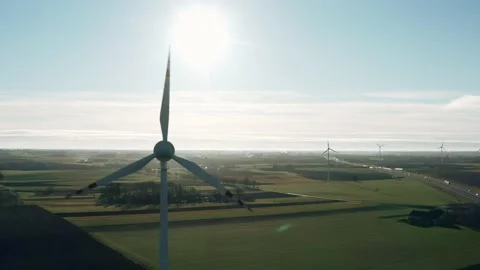 Aerial drone view windmills wind turbines. Wind farm generating renewable energy Stock Footage 165702741