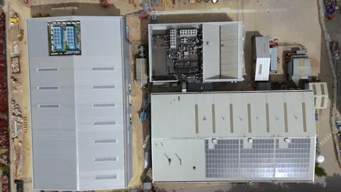 Aerial drone warehouse data centre fans business quantum computing UK England Stock Footage 308589074