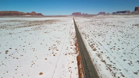Aerial Drone Winter View, long road, Monument Valley, Arizona Desert Rare, West Stockbeeldmateriaal 318972264