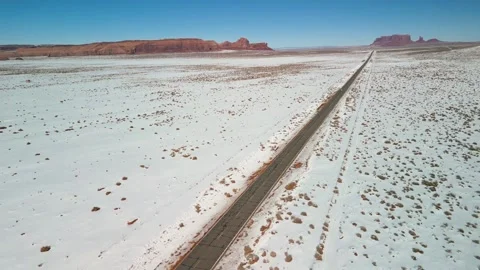 Aerial Drone Winter View, long road, Monument Valley, Arizona Desert Rare, West Stockbeeldmateriaal 318972309