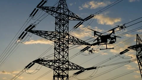 Aerial drones inspect ultra-high voltage power towers Stock Footage 333877817