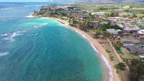 Aerial Drones view of Exploring the Hidden Beauty of Kapaa beach in Kauai Stock Footage 303040434
